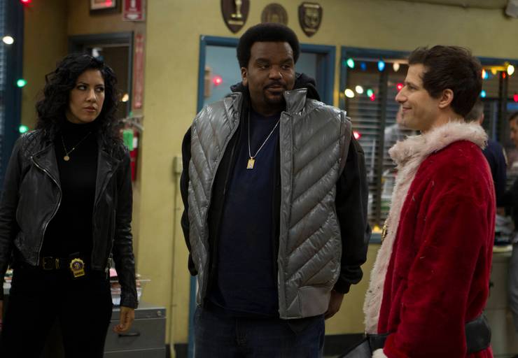 Stephanie Beatriz, Craig Robinson und Andy Samberg in Brooklyn Nine-Nine