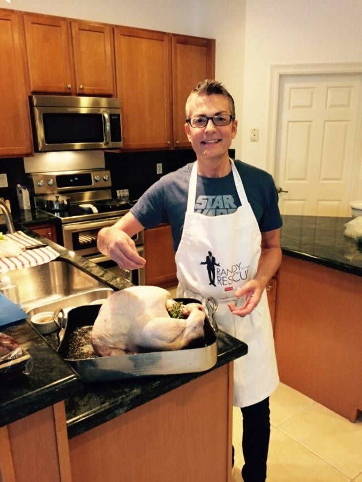 Randy cooking a turkey