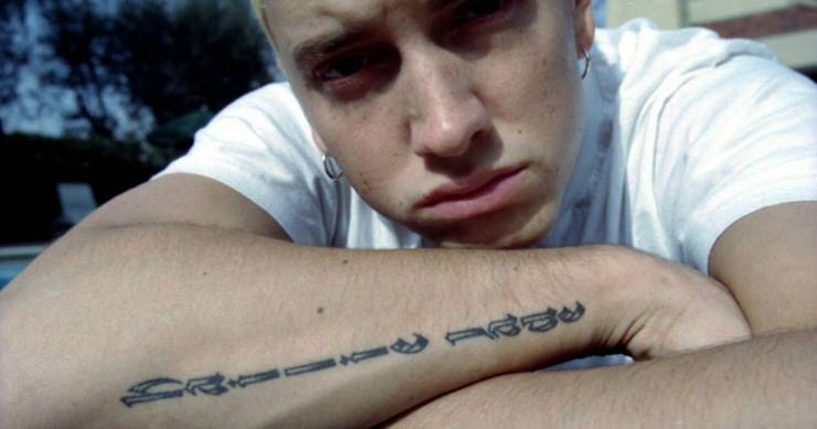 Eminem S 9 Tattoos Explained Thethings